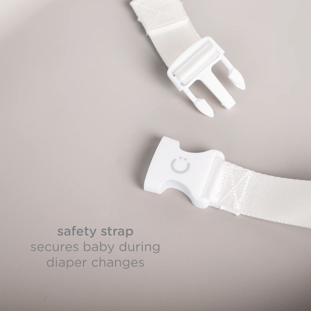 Ubbi Foam Changing Pad - Taupe - Safety strap