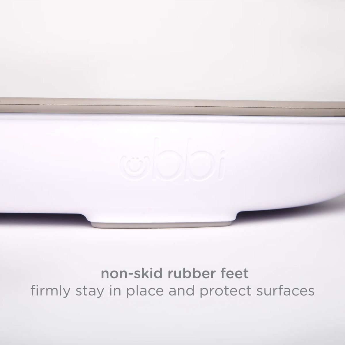 Ubbi Foam Changing Pad - Taupe - Non-skid rubber feet